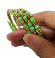 Load image into Gallery viewer, Peridot Green Color Calcite Bead Memory Wire Wrap Bracelet
